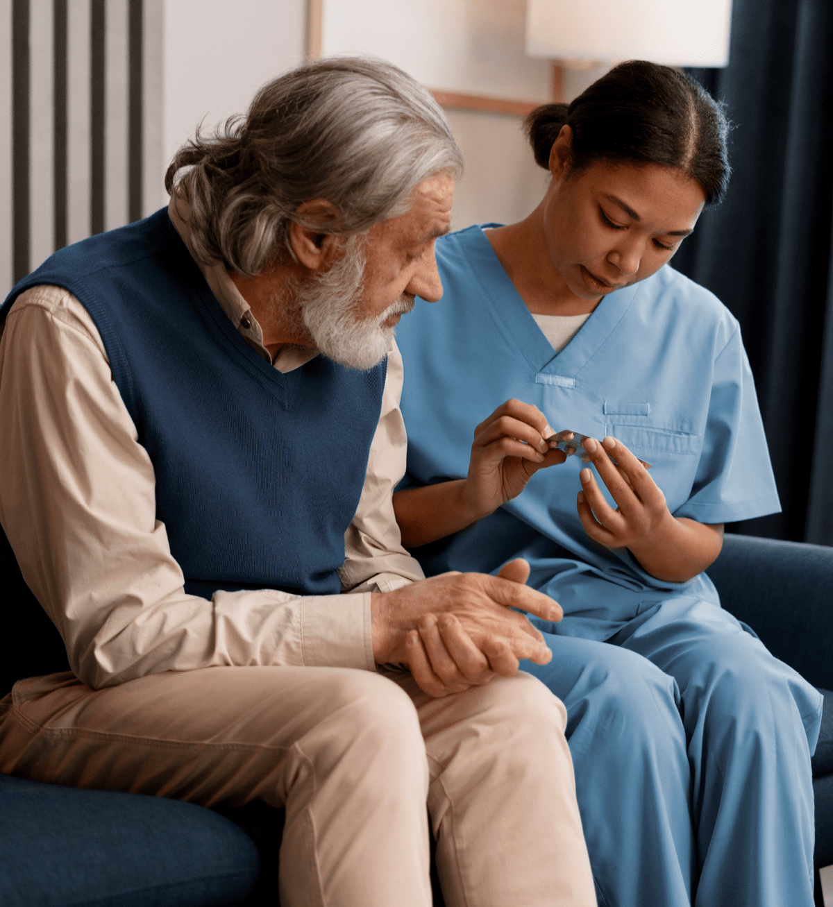Nurse assisting a senior man