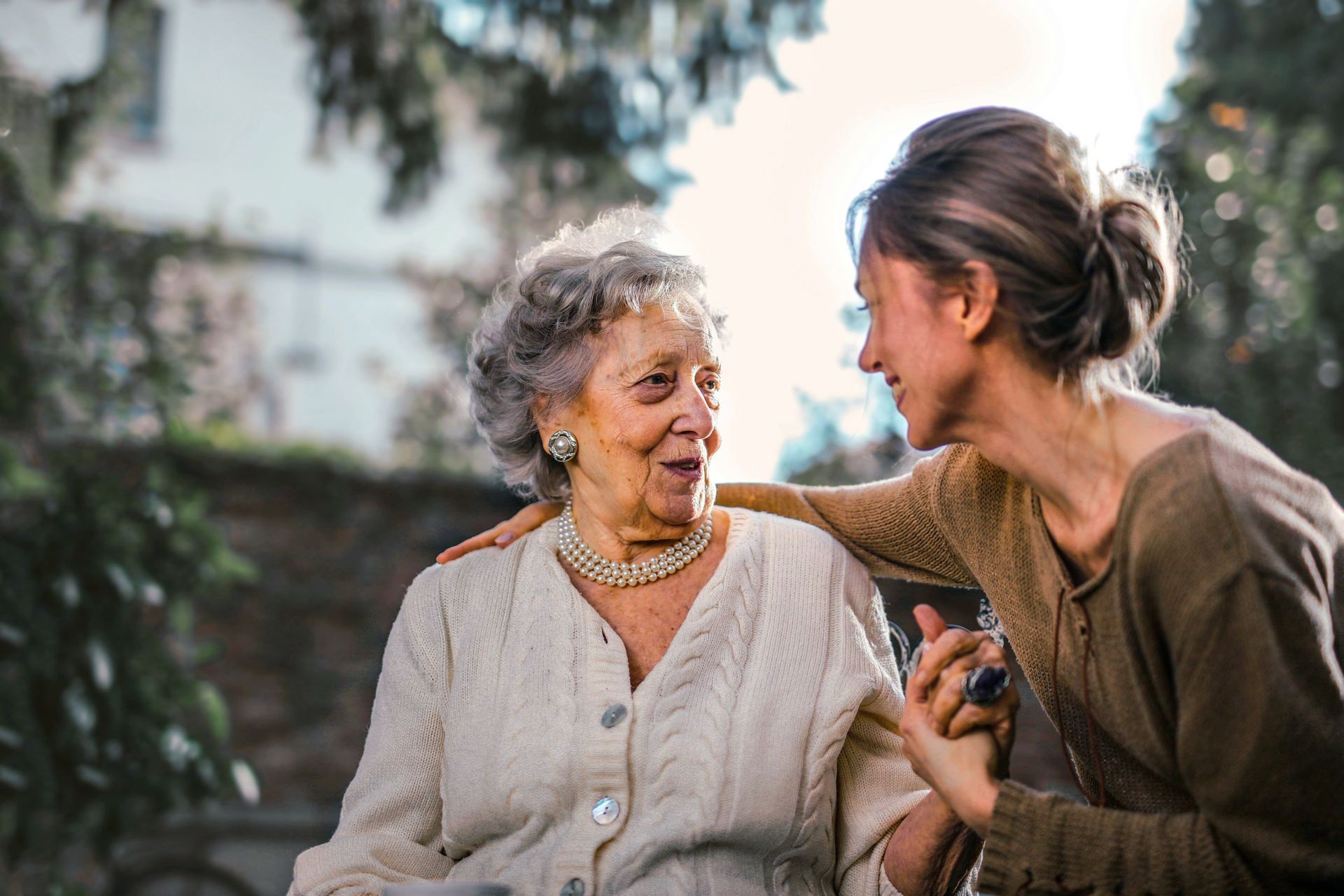 Caregiver and family member sharing a moment